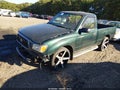 2003 Toyota Tacoma — photo 2 of 11 | VIN 5TENL42N73Z269176