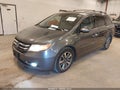 2014 Honda Odyssey — photo 2 of 16 | VIN 5FNRL5H9XEB032882