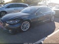2016 Tesla Model S — photo 2 of 18 | VIN 5YJSA1E28GF129394