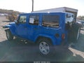 2011 Jeep Wrangler Unlimited — photo 3 of 16 | VIN 1J4BA5H1XBL560121