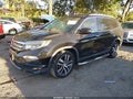 2016 Honda Pilot — photo 2 of 16 | VIN 5FNYF6H93GB056484
