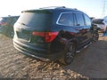 2016 Honda Pilot — photo 4 of 16 | VIN 5FNYF6H93GB056484