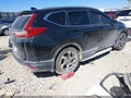 2018 Honda CR-V — photo 4 of 17 | VIN 7FARW1H95JE002607
