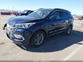 2017 Hyundai Santa Fe — photo 2 of 15 | VIN 5XYZU3LB3HG409125