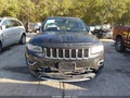 2015 Jeep Grand Cherokee — photo 12 of 16 | VIN 1C4RJFBG4FC198073