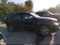 2015 Jeep Grand Cherokee — photo 13 of 16 | VIN 1C4RJFBG4FC198073
