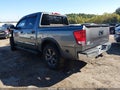 2015 Nissan Titan — photo 3 of 19 | VIN 1N6BA0ED0FN502792