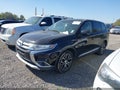 2016 Mitsubishi Outlander — photo 2 of 11 | VIN JA4AD2A3XGZ031186