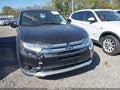 2016 Mitsubishi Outlander — photo 6 of 11 | VIN JA4AD2A3XGZ031186