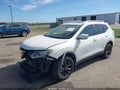 2014 Nissan Rogue — photo 2 of 17 | VIN 5N1AT2MV4EC823058