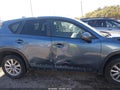 2015 Mazda CX-5 — photo 13 of 17 | VIN JM3KE4CY3F0445335