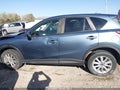 2015 Mazda CX-5 — photo 14 of 17 | VIN JM3KE4CY3F0445335