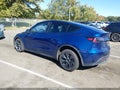 2025 Tesla Model Y — photo 3 of 14 | VIN 7SAYGAEE2SF296638