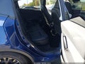 2025 Tesla Model Y — photo 8 of 14 | VIN 7SAYGAEE2SF296638
