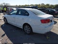 2014 Volkswagen Jetta — photo 3 of 13 | VIN 3VWD07AJ1EM223361