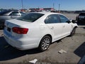 2014 Volkswagen Jetta — photo 4 of 13 | VIN 3VWD07AJ1EM223361