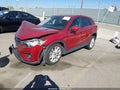 2014 Mazda CX-5 — photo 2 of 15 | VIN JM3KE4DYXE0342121