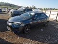2015 Toyota Corolla — photo 2 of 16 | VIN 5YFBURHE0FP290787