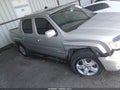 2013 Honda Ridgeline — photo 13 of 16 | VIN 5FPYK1F52DB010937