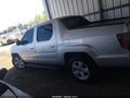 2013 Honda Ridgeline — photo 14 of 16 | VIN 5FPYK1F52DB010937
