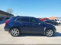 2011 Cadillac SRX — photo 13 of 18 | VIN 3GYFNCEY2BS627140