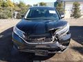 2016 Honda CR-V — photo 12 of 16 | VIN 2HKRM4H36GH600780