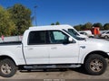 2002 Ford F-150 — photo 13 of 16 | VIN 1FTRW08L72KE14422