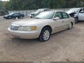 2001 Lincoln Continental — photo 2 of 11 | VIN 1LNHM97V61Y715702