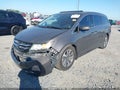 2014 Honda Odyssey — photo 2 of 17 | VIN 5FNRL5H98EB137369