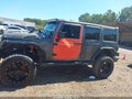 2013 Jeep Wrangler Unlimited — photo 14 of 16 | VIN 1C4HJWEG8DL625727