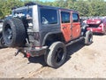 2013 Jeep Wrangler Unlimited — photo 4 of 16 | VIN 1C4HJWEG8DL625727