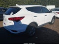 2017 Hyundai Santa Fe — photo 4 of 16 | VIN 5NMZU3LB4HH032309