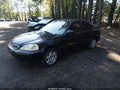 2000 Honda Civic — photo 2 of 11 | VIN 1HGEJ8543YL045720