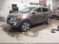 2012 Kia Sportage — photo 2 of 11 | VIN KNDPCCA27C7327370