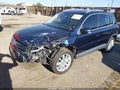 2013 Volkswagen Tiguan — photo 2 of 16 | VIN WVGAV3AX8DW575237