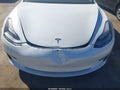 2021 Tesla Model 3 — photo 6 of 18 | VIN 5YJ3E1EAXMF001413