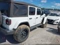 2022 Jeep Wrangler Unlimited — photo 4 of 16 | VIN 1C4HJXEG0NW106953