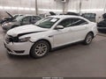 2014 Ford Taurus — photo 2 of 16 | VIN 1FAHP2E88EG145123