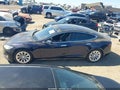 2013 Tesla Model S — photo 13 of 15 | VIN 5YJSA1CP1DFP13761