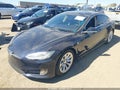 2013 Tesla Model S — photo 2 of 15 | VIN 5YJSA1CP1DFP13761