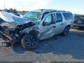 2011 Chevrolet Suburban 1500 — photo 2 of 16 | VIN 1GNSKJE36BR324457