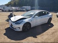 2018 Tesla Model 3 — photo 2 of 15 | VIN 5YJ3E1EB9JF108537