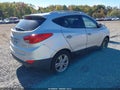 2010 Hyundai Tucson — photo 4 of 12 | VIN KM8JUCAC0AU081235