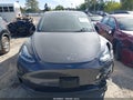 2022 Tesla Model Y — photo 11 of 17 | VIN 7SAYGDEE3NA009827