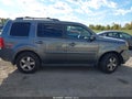 2010 Honda Pilot — photo 12 of 15 | VIN 5FNYF4H56AB025593