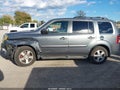 2010 Honda Pilot — photo 13 of 15 | VIN 5FNYF4H56AB025593