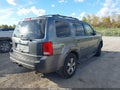 2010 Honda Pilot — photo 4 of 15 | VIN 5FNYF4H56AB025593