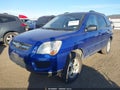 2009 Kia Sportage — photo 2 of 11 | VIN KNDJF724497602478