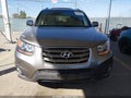 2011 Hyundai Santa Fe — photo 12 of 19 | VIN 5XYZH4AG7BG042472