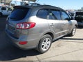 2011 Hyundai Santa Fe — photo 4 of 19 | VIN 5XYZH4AG7BG042472